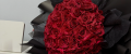 Red faux glitter rose with sparkling petals